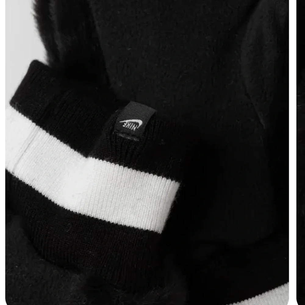 Nike women’s mittens with faux fur on the outside and soft fleece on the inside